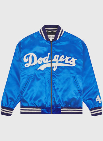 The EFF Brooklyn Dodgers 1947-50 Authentic All Satin Varsity Jacket features a bright blue satin finish, classic white Dodgers script across the chest, striped collar, cuffs, and hem, and the number 44 on the left sleeve. Inspired by the iconic team jacket from 1947 honoring Jackie Robinson’s legacy, this piece is displayed laid flat on a light background.