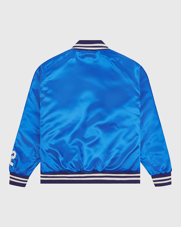 The EFF Brooklyn Dodgers 1947-50 Authentic All Satin Varsity Jacket is pictured from the back in a lustrous blue satin finish, featuring striped ribbed cuffs and collar, and a white number detail on one sleeve—a classic homage to Jackie Robinson’s iconic Brooklyn Dodgers jacket.