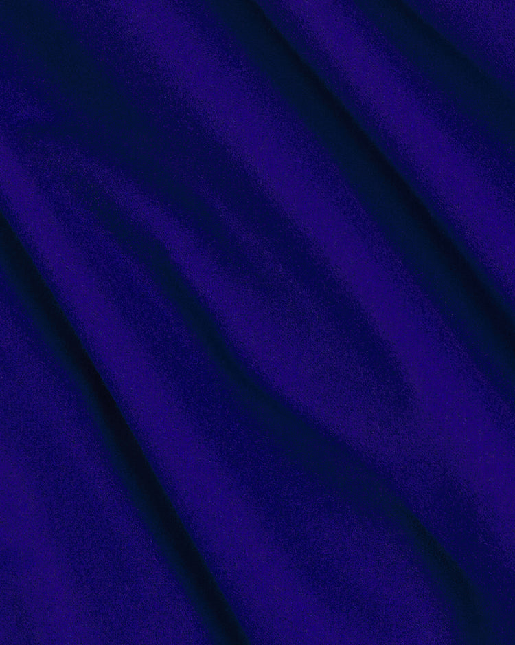 Rich, dark blue all-wool fabric with soft, diagonal folds and subtle shadows evokes a sense of texture and depth—faithfully capturing the iconic look of the 1969 New York Mets jacket. The EFF New York Mets 1969 Authentic All Wool Varsity Jacket is an authentic reproduction honoring the legendary Miracle Mets.