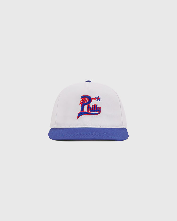 The Philadelphia Stars A-Frame Cotton Twill Ballcap by Ebbets Field is a retro white baseball hat featuring a blue brim and an embroidered red, blue, and white 