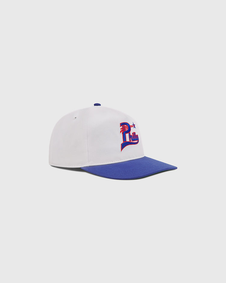 Introducing the Philadelphia Stars A-Frame Cotton Twill Ballcap by Ebbets Field. This retro-inspired white cap boasts a blue brim and an embroidered red and blue letter 