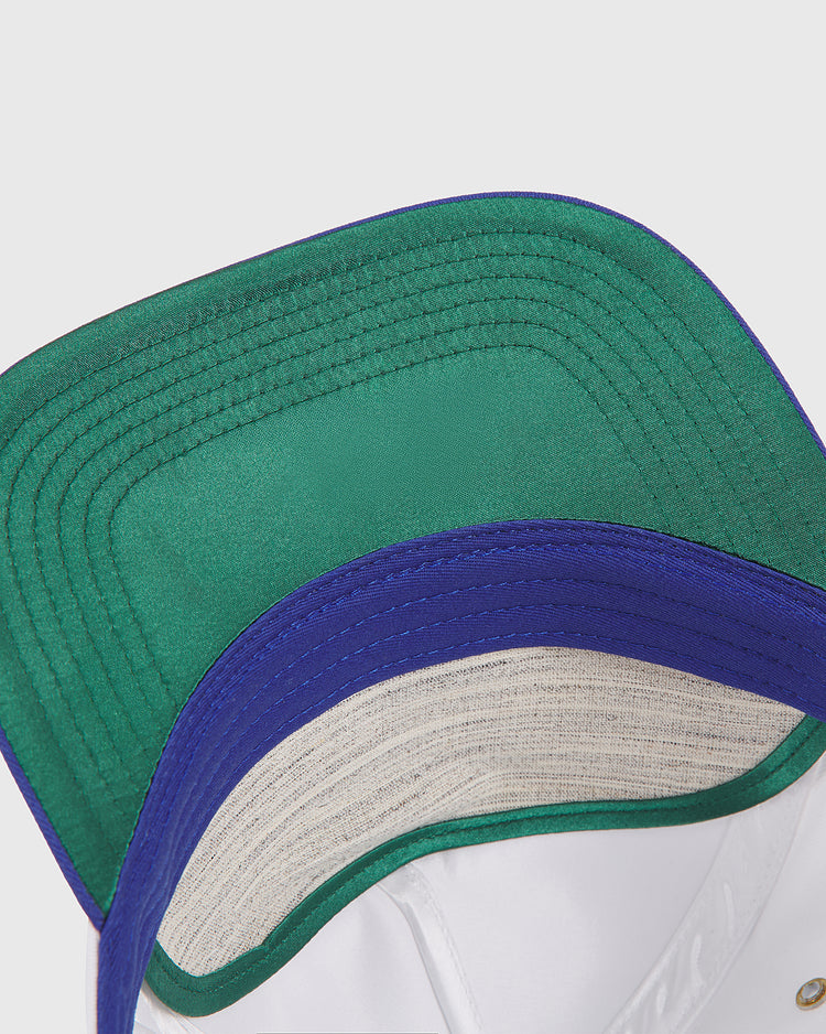 Close-up view of the underside of the Philadelphia Stars A-Frame Cotton Twill Ballcap by Ebbets Field, highlighting the green and blue retro brim stitching and white inner lining with a mesh section.
