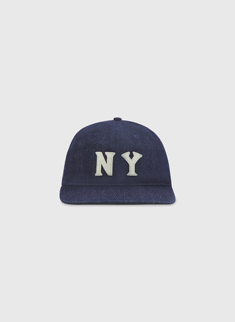 An Ebbets Field New York Black Yankees Indigo Cotton Denim Ballcap with bold white NY lettering on the front, shown against a plain light gray background.
