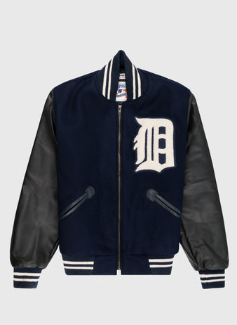 The EFF Detroit Tigers 1955 Authentic Wool & Leather Varsity Jacket features navy wool, black leather sleeves, striped ribbed trim, a front zipper, and a large white D patch—a replica worn by Al Kaline.