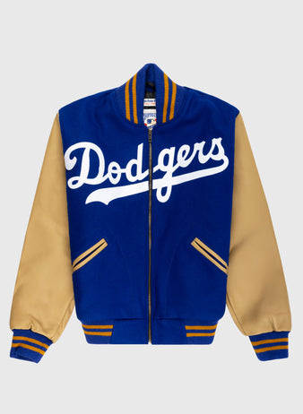 The EFF Brooklyn Dodgers 1951 Authentic Wool & Leather Varsity Jacket has a blue body, tan sleeves, striped cuffs and waistband, and large white Dodgers script—ideal for fans of classic Brooklyn Dodgers style.