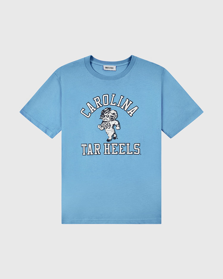 The Ebbets Field University of North Carolina Short Sleeve Tee is light blue with Carolina Tar Heels text and a cartoon ram mascot in white and black on the front.