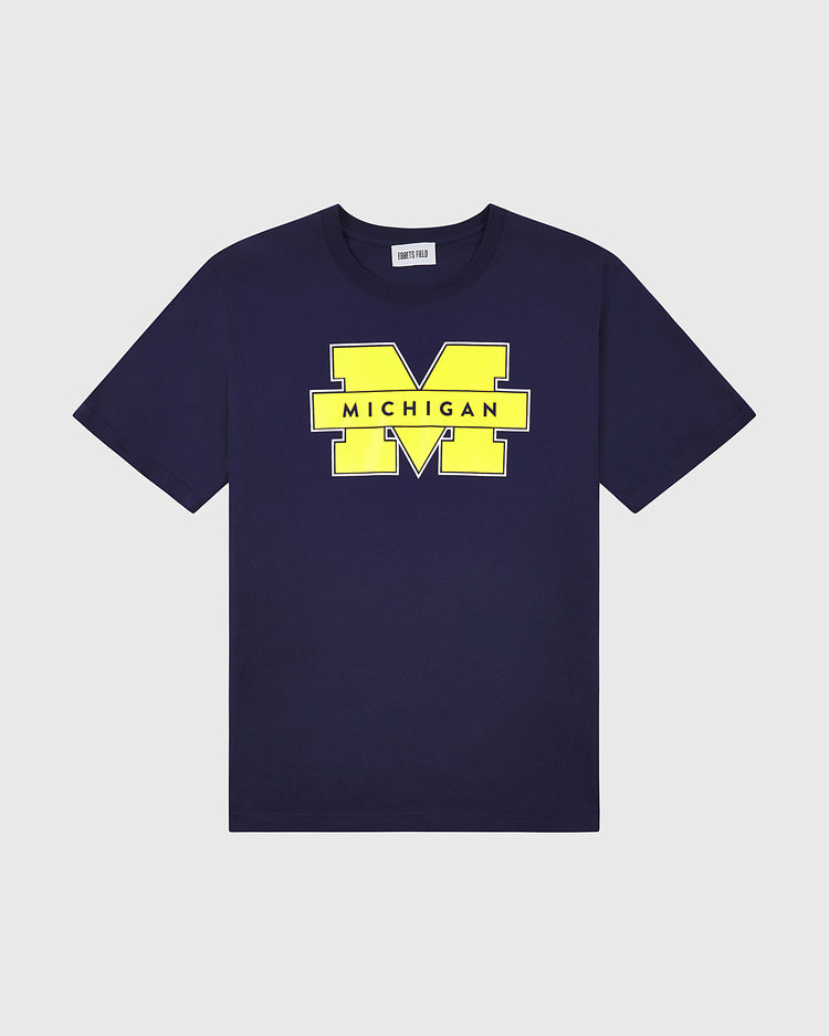 The Ebbets Field MICHIGAN SS TEE NAVY features a bold yellow M and Michigan printed across the chest.