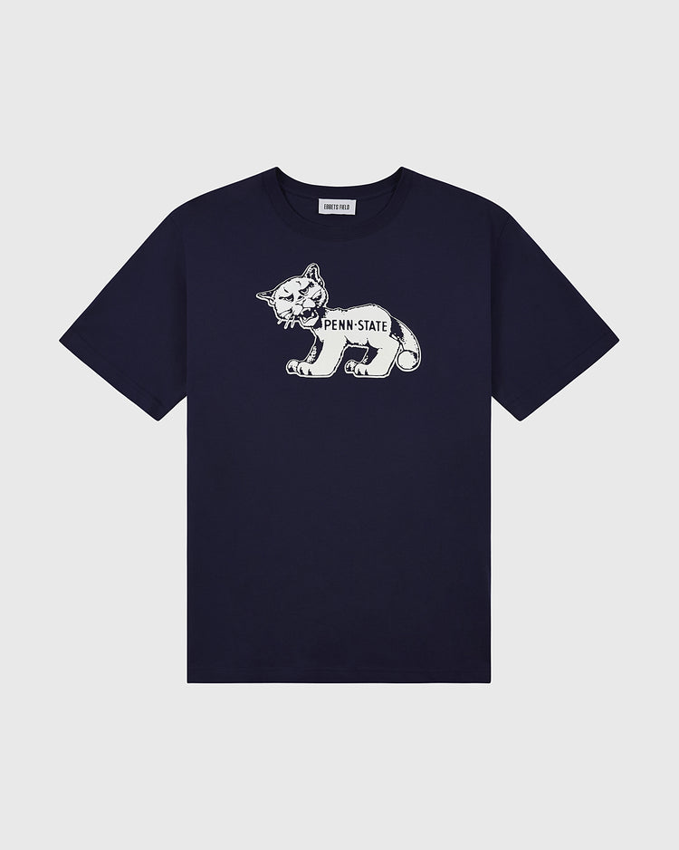 The Ebbets Field PENN STATE SS TEE NAVY is a navy blue shirt with a white mountain lion graphic and PENN STATE text on the front, displayed against a plain light gray background.