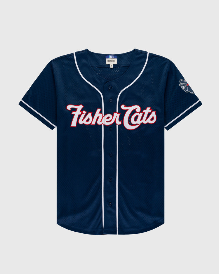 The Ebbets Field VLAD GUERRERO JR BUTTON UP MESH JERSEY in navy features white piping, Fisher Cats script in red and white on the chest, and a cat face patch on the left sleeve.