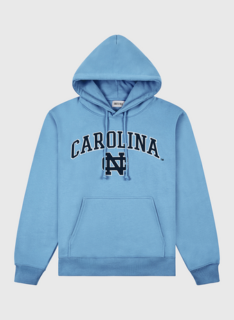 The University of North Carolina Heavyweight Cotton Terry Pullover Hoodie by Ebbets Field features “CAROLINA” in bold black letters and an interlocking “NC” logo, front pocket, and ribbed cuffs—perfect for showing Tar Heels pride. Laid flat on white background.