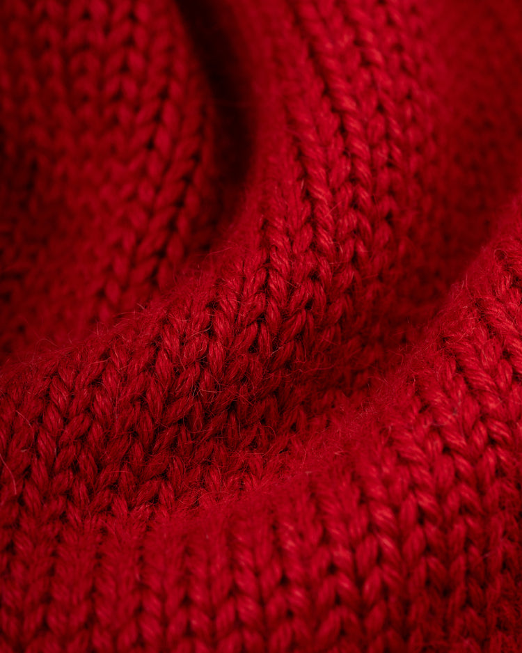 Close-up of the EFF St. Louis Cardinals 1908 Wool Shawl Collar Sweater, highlighting the soft red knit, detailed textured stitches, and rich color that showcase this authentic vintage-inspired garment.
