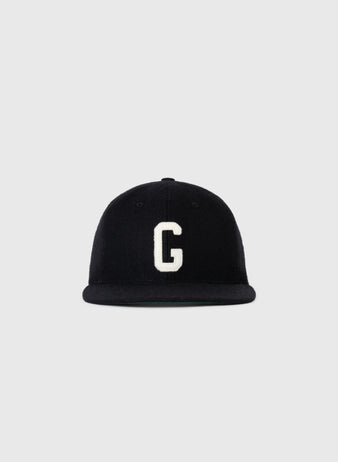 The EFF Homestead Grays 1945 Authentic Wool Ballcap is black with a white embroidered G on the front, inspired by the original ballcap and shown against a plain light gray background.