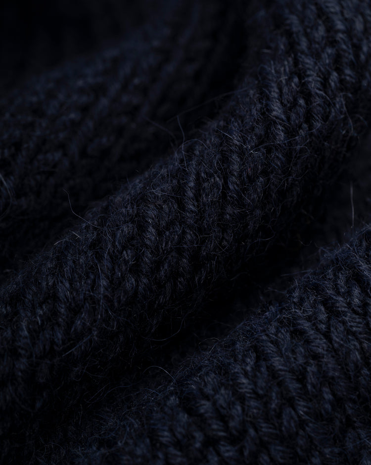 Close-up of thick, textured wool knit highlights the soft, cozy feel of the Ebbets Field Flannels Minnesota Twins 1961-71 Wool Shawl Collar Sweater.