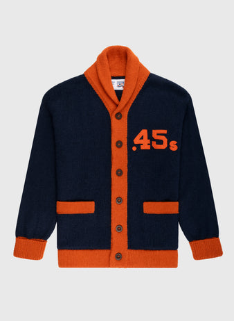 The Ebbets Field Flannels Houston Colt .45s 1962-64 Wool Shawl Collar Sweater is navy with orange trim, collar, cuffs, and pockets. Inspired by vintage baseball sweaters, it has brown buttons and large orange .45s on the left chest.