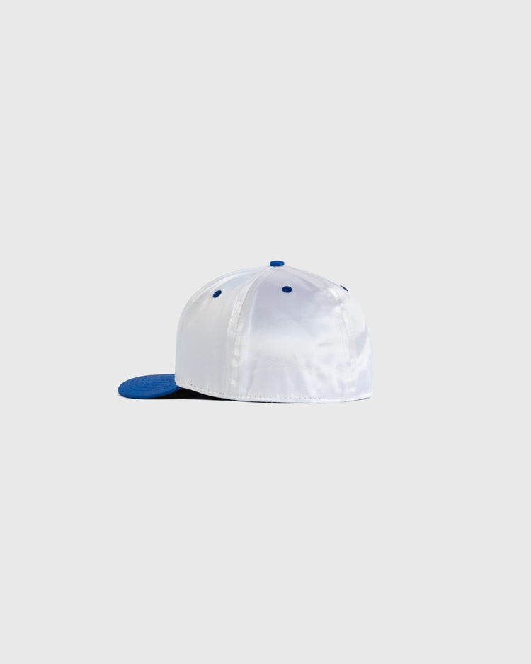 The EFF Montreal Royals 1946 Authentic All Satin Ballcap is shown from the back, featuring a white crown with blue brim and button accents, displayed on a plain light grey background.