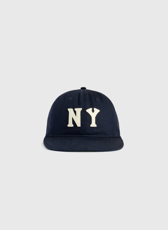 The Ebbets Field New York Black Yankees Felt NY Cotton Twill Ballcap features large white NY embroidery on the front and is shown against a plain light grey background.