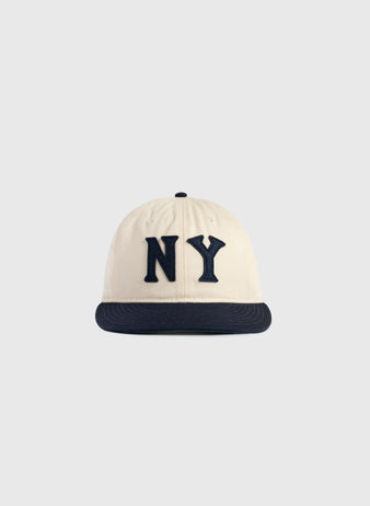 The Ebbets Field New York Black Yankees Felt NY Cotton Twill Ballcap features a cream cotton twill crown, black brim, and large black NY felt letters, inspired by classic Black Yankees caps, shown on a plain light gray background.
