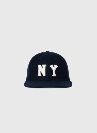 The EFF New York Black Yankees 1936 Authentic Wool Ballcap is navy blue with large white NY letters on the front, inspired by a classic design, and shown against a light gray background.