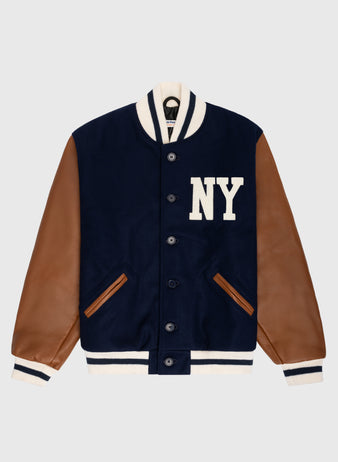 The EFF New York Black Yankees 1940 Authentic Wool & Leather Varsity Jacket features a navy wool body, brown leather sleeves, white striped cuffs and collar, plus bold NY chest letters—crafted in partnership with the Negro Leagues Baseball Museum.