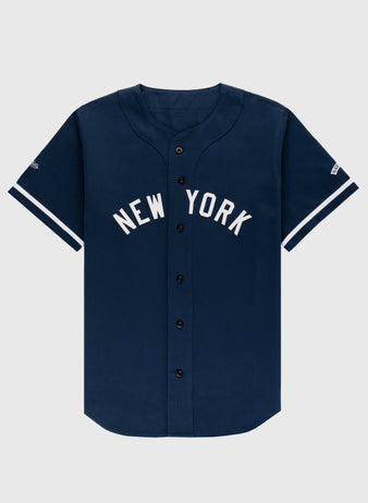 The Ebbets Field New York Black Yankees Cotton Twill Baseball Jersey features NEW YORK in white letters across the chest and white sleeve stripes, shown against a plain light background.