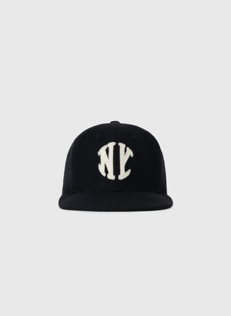 The EFF New York Knickerbockers 1912 Authentic Wool Ballcap is a vintage-style black cap with a white NY logo, modeled after the original 1912 design, shown on a plain light gray background.