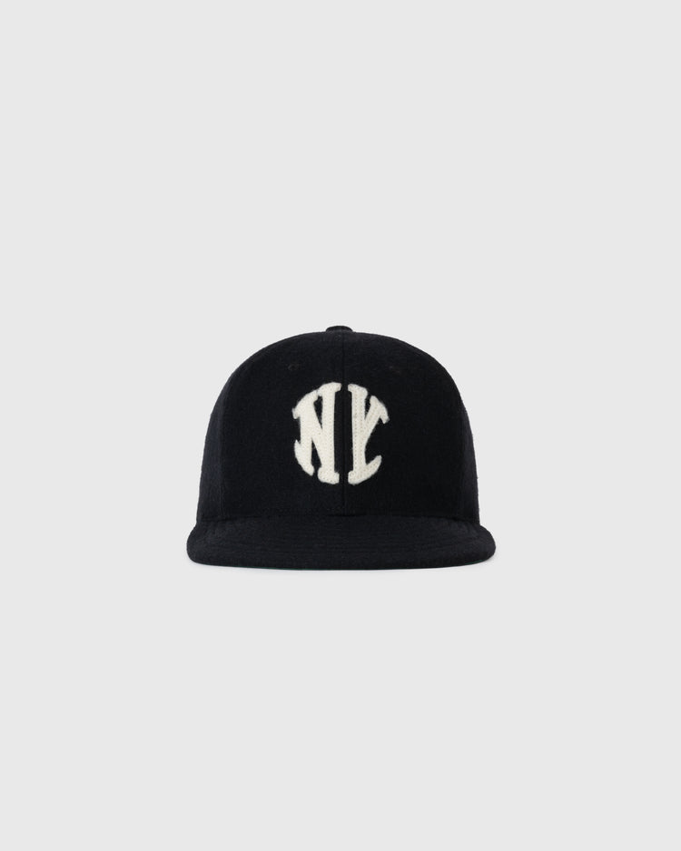 The Ebbets Field NEW - New York Knickerbockers 1912 Vintage Ballcap features a black design with a white NY logo, shown against a plain light gray background.