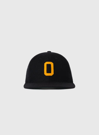 The EFF Oakland Larks 1946 Authentic Wool Ballcap is a black wool cap with a bold yellow embroidered O on the front, shown on a plain light gray background.