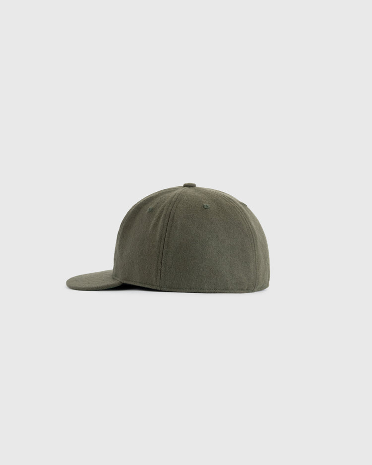 The EFF Olive Wool Ballcap is shown in a side view against a light gray background. This six-panel cap features visible stitching and a curved brim, offering a timeless accessory for any casual look.
