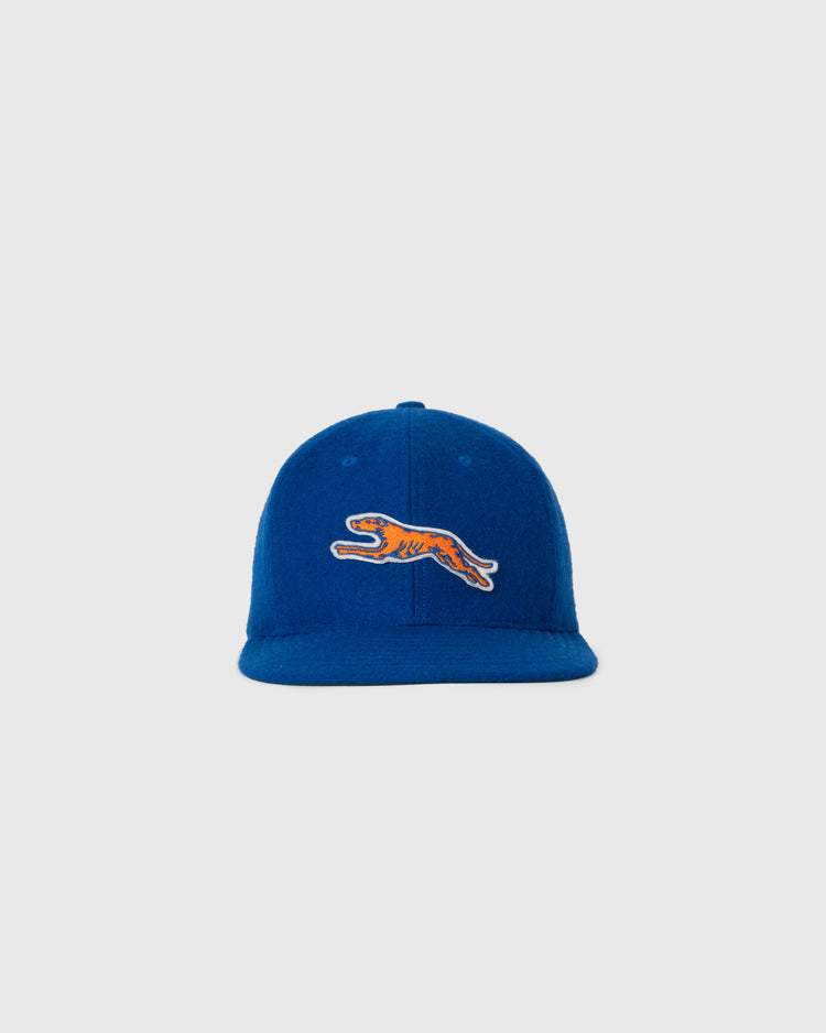 The Ebbets Field NEW - Pacific Greyhound 1939 Vintage Ballcap features an embroidered orange and black tiger logo on blue fabric, shown against a plain light gray background.