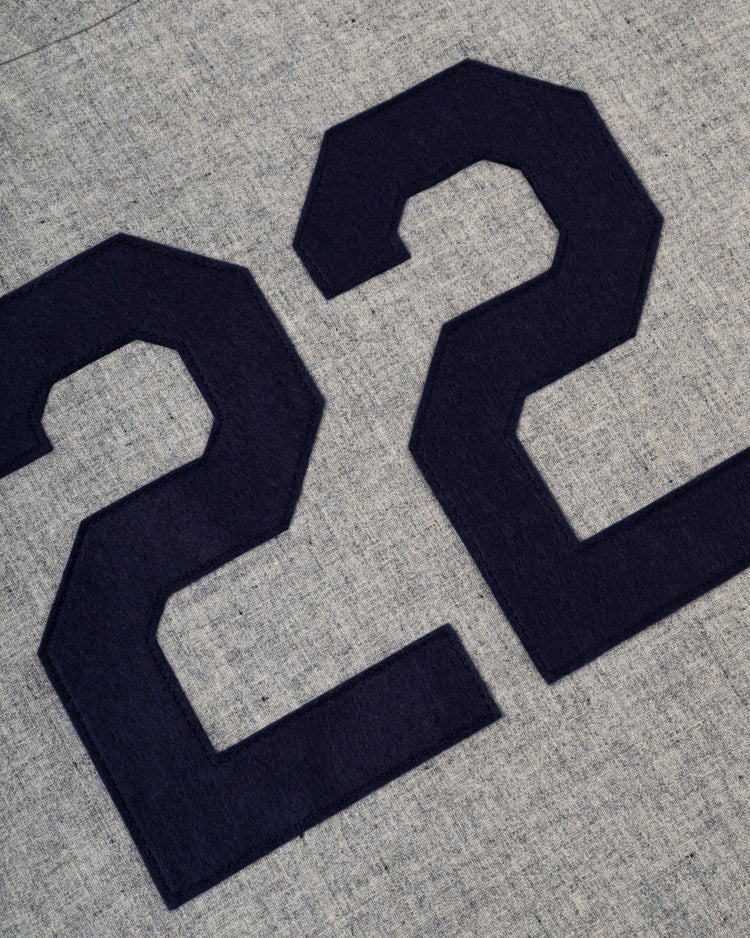 Large, dark blue felt 22s are sewn onto light gray wool on the Ebbets Field Penn State University 1955 Authentic Road Baseball Jersey, echoing the classic Nittany Lions look.