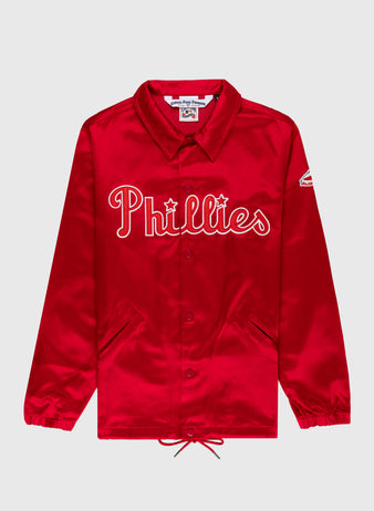 The EFF Philadelphia Phillies 1950 Satin Windbreaker Jacket features bold red satin, “Phillies” in white script, a team sleeve patch, collar, snap buttons, and adjustable waist—ideal for MLB vintage fans.