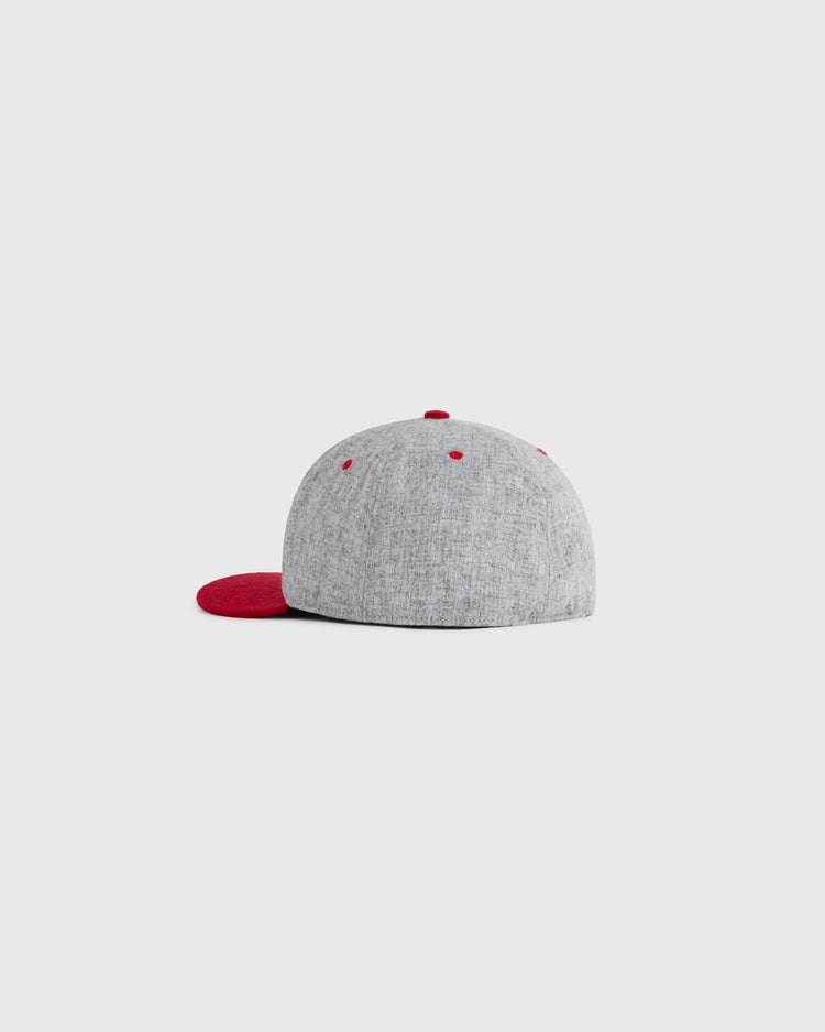 The EFF Puerto Rico All-Star Team 1939 Authentic Wool Ballcap is shown from the back, featuring a gray design with a red flat brim and red button, displayed on a plain light background.