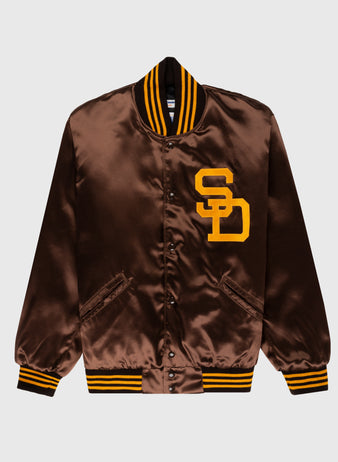 The EFF San Diego Padres 1969 Authentic All Satin Varsity Jacket features brown satin, yellow SD chest letters, and yellow-black striped cuffs, collar, and hem, replicating the team’s classic vintage style.