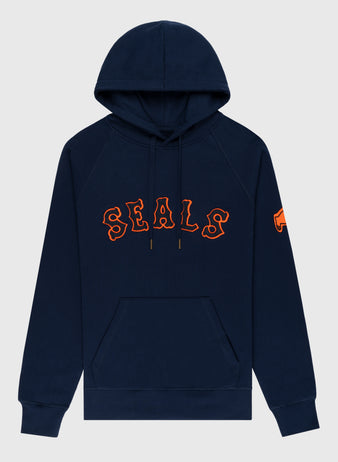 The EFF San Francisco Seals Cotton French Terry Pullover Hoodie features a navy blue design, front pocket, drawstring hood, bold orange-outlined SEALS print across the chest, and an orange patch on the left sleeve.