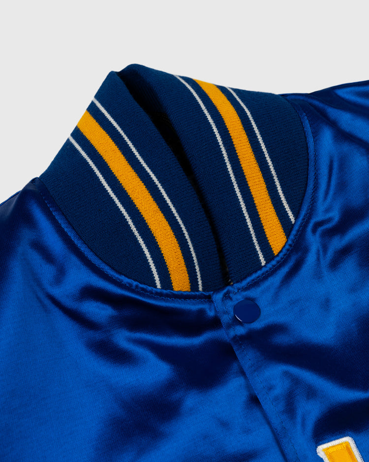 Close-up of the EFF Seattle Mariners 1982 Authentic All Satin Varsity Jacket, featuring shiny royal blue satin and a ribbed navy collar with yellow and white stripes.
