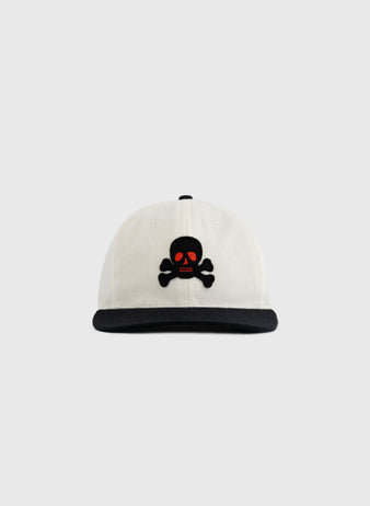 The EFF Sioux City Ghosts Two Tone Vintage Inspired Wool Ballcap is a white cap with a black brim, featuring a black skull and crossbones with red eyes embroidered on the front, shown against a plain light gray background.