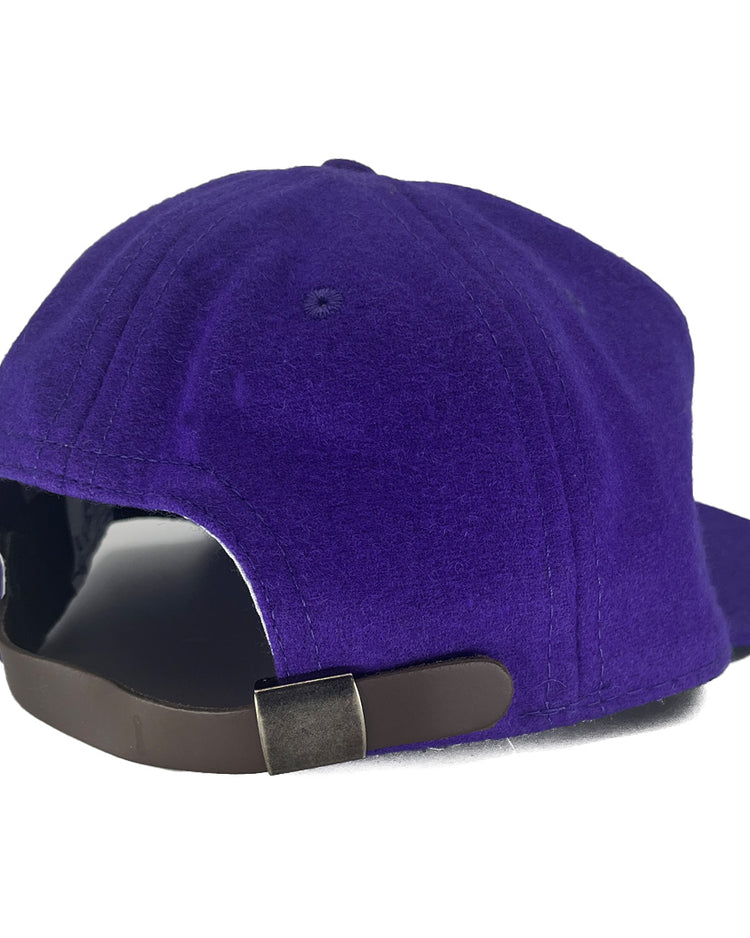 The EFF Texas Christian University 1963 Vintage Ballcap is a purple genuine wool cap shown from the back, with a black adjustable strap and metal clasp.