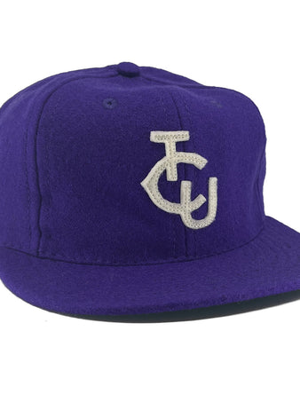 The EFF Texas Christian University 1963 Vintage Ballcap is a genuine purple wool flat-brim hat with a white TCU monogram—ideal for fans seeking an authentic TCU ballcap.