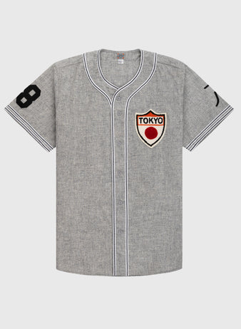 The Ebbets Field Flannels Tokyo Kyojin (Giants) 1936 Authentic Wool Road Baseball Jersey features gray flannel, white and black striped trim, a black number 8 right sleeve, left sleeve mark, and a Tokyo patch with red circle.