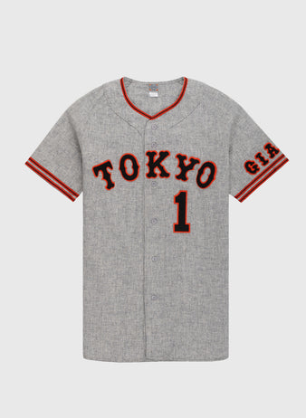 The Ebbets Field Flannels Tokyo Kyojin (Giants) 1961 Authentic Wool Road Baseball Jersey features gray wool, TOKYO and #1 in black/red, striped sleeve trim, and G.I.A. patch—faithful to the classic 1961 Giants design.