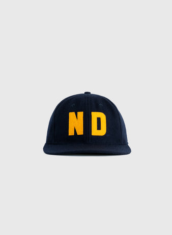 The EFF University of Notre Dame 1966 Authentic Wool Ballcap in navy features large yellow ND letters on the front, shown against a light gray background.