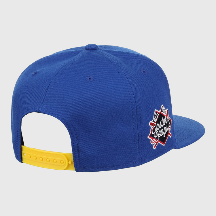 The Vermont Mariners EFF MiLB Vintage Snapback by Ebbets Field Flannels is a blue cap with a yellow adjustable strap and Classic League patch with crossed bats, inspired by the Vermont Mariners. Shown from back and side.