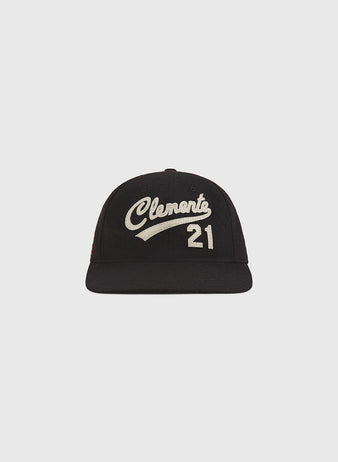 Introducing The Clemente Museum X Ebbets Field Wool Ballcap by Ebbets Field—a black wool cap featuring white script embroidery of “Clemente” and the number 21 on the front. Part of the exclusive Clemente collection, this ballcap is shown against a simple, light background and honors the iconic Roberto Clemente Museum.