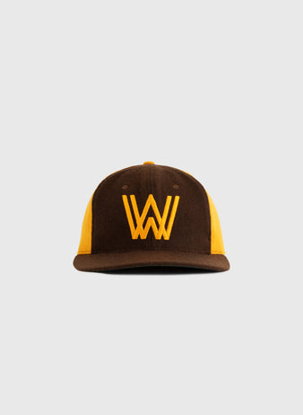 The EFF Walla Walla Padres 1974 Authentic Wool Ballcap features a brown and yellow design with a bold yellow “W” logo, replicating the original Northwest League style, shown against a plain light gray background.