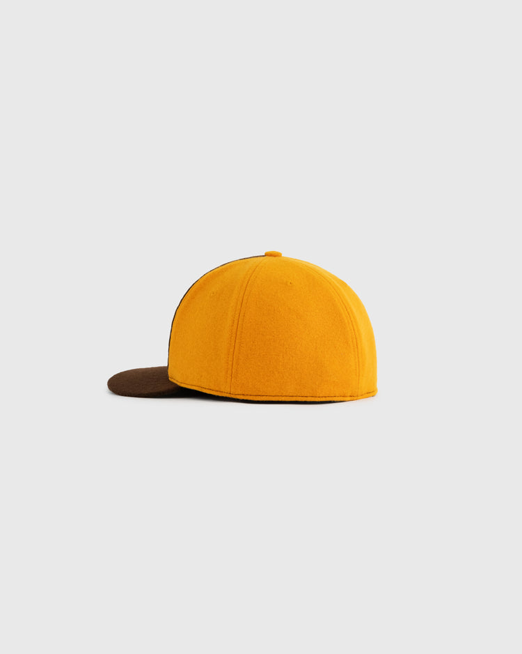 The Walla Walla Padres 1974 Authentic Wool Ballcap by EFF features a yellow crown, brown brim, and side profile against a plain light gray background—a true replica from the classic Northwest League era.
