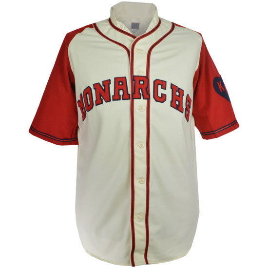 The EFF Kansas City Monarchs 1942 Home Jersey features a cream body, red sleeves, bold red and blue MONARCHS across the chest, and a dark blue KC inside a heart patch on the left sleeve honoring the legendary team.