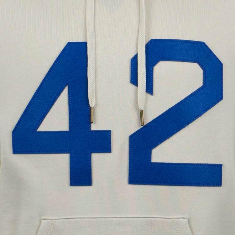 A close-up of the EFF Jackie Robinson French Terry Script Hooded Sweatshirt in natural—a hoodie with bold blue 42 on the front and white drawstrings, honoring the 75th anniversary.