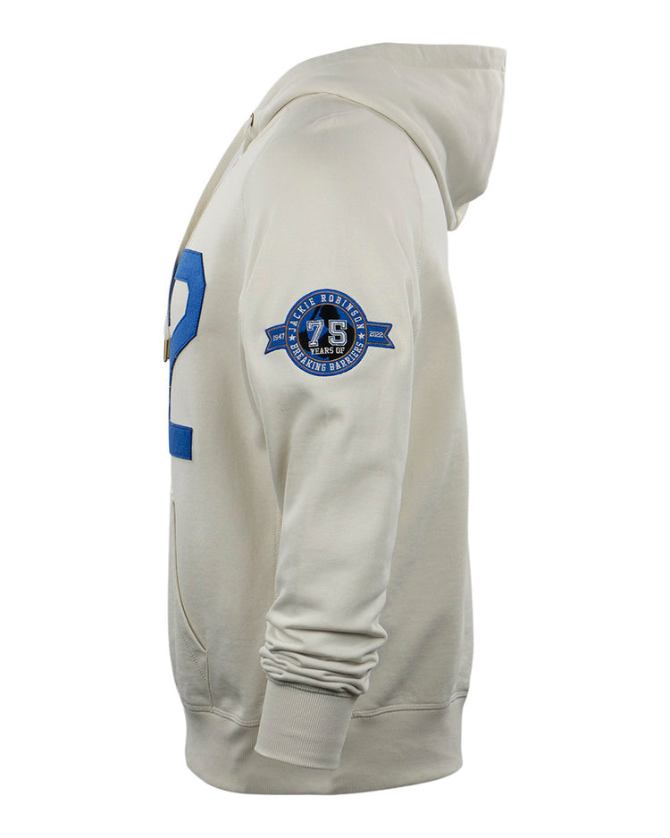 Side view of the EFF Jackie Robinson French Terry Script Hooded Sweatshirt in natural, featuring a blue number on the front and a blue 75 Years emblem patch on the upper sleeve, honoring Jackie Robinson’s 75th anniversary.