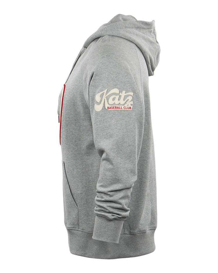 Side view of the EFF Kansas City Katz French Terry Script Hooded Sweatshirt in gray, featuring a front pocket and cream/red Katz Baseball Club text on the upper left sleeve, inspired by Kansas Citys Katz Drugstore and baseball heritage.