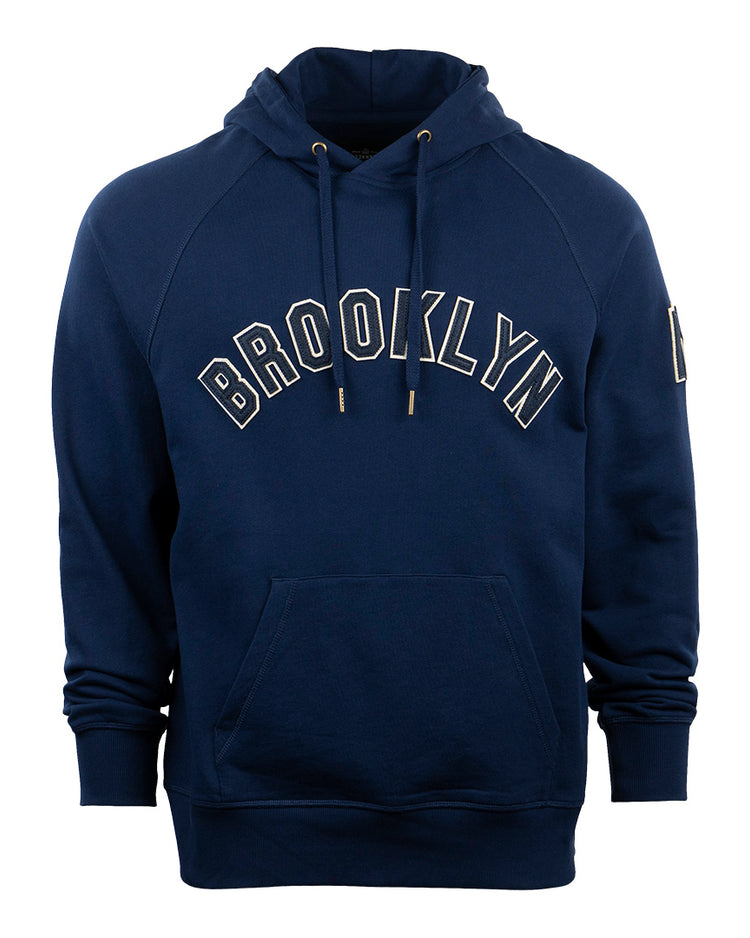 The EFF Brooklyn Eagles French Terry Script Hooded Sweatshirt features a navy blue color, front pocket, drawstrings, and BROOKLYN EAGLES in white arched lettering—a tribute to Brooklyn’s baseball legacy.